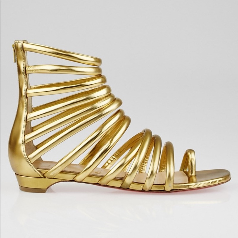 CHRISTIAN LOUBOUTIN
Gold Speccio Catchetta Sandals